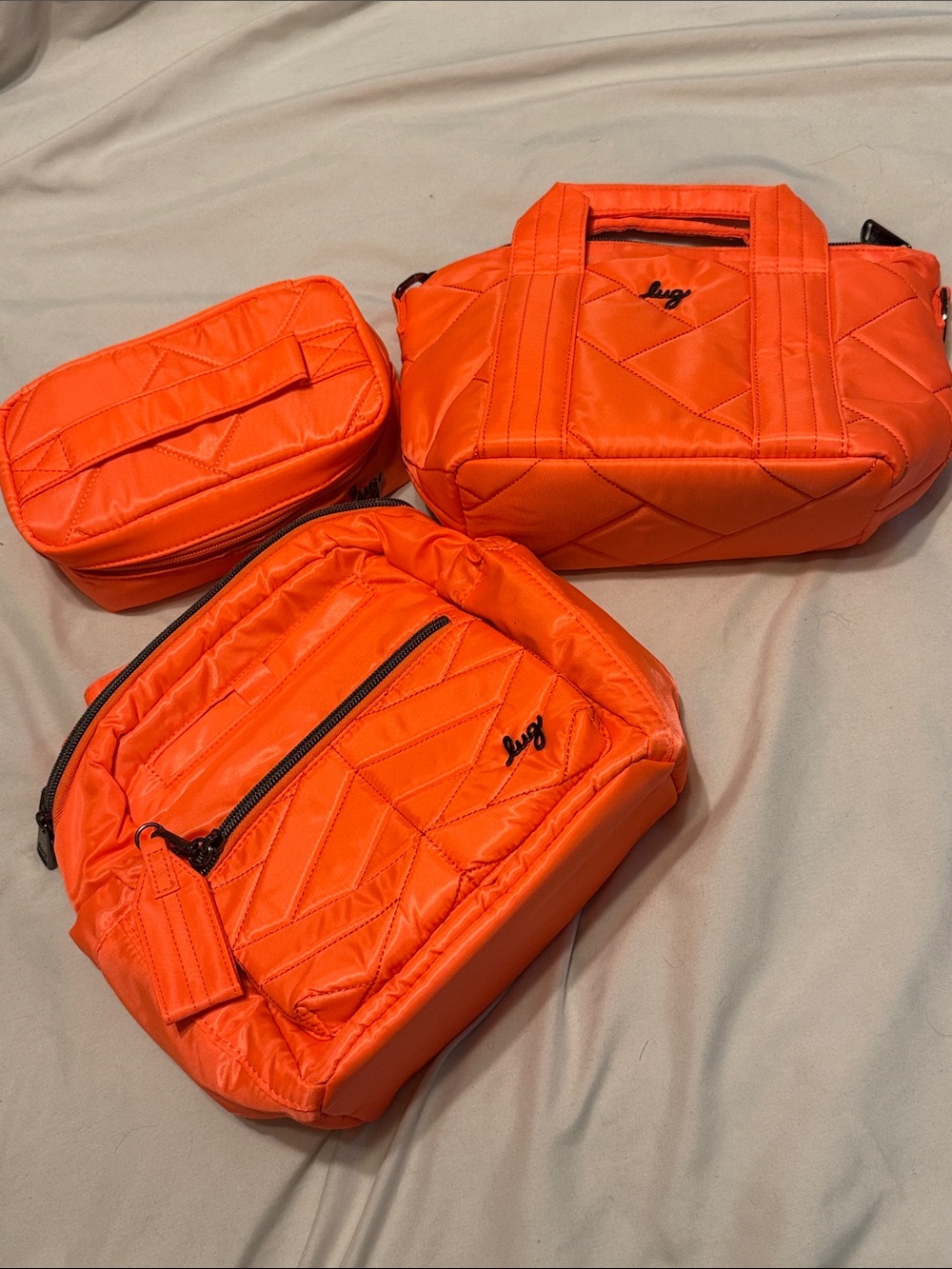 lug Quilted Travel Bag Trio in Vibrant Orange - Picture 1 of 1